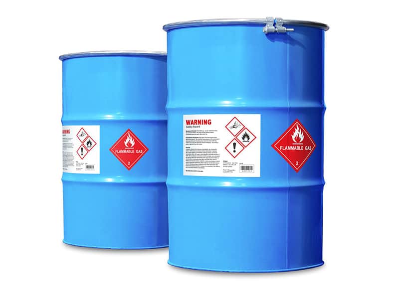 Barrels of chemicals with hazard labeling