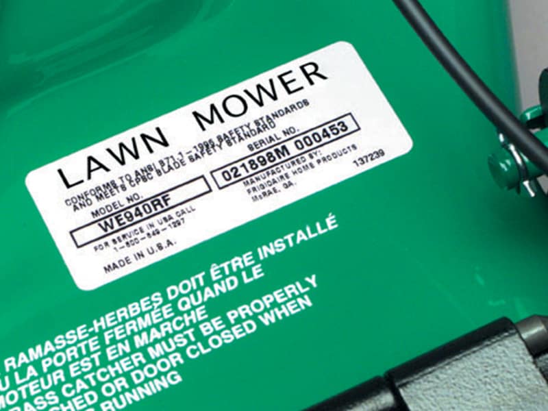 A lawn mower with an insustrial label